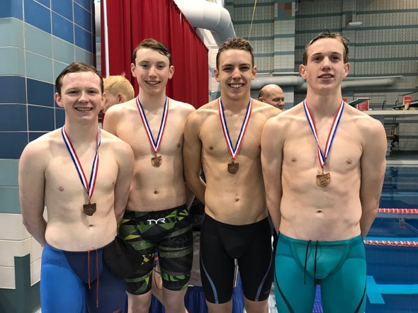 male swimmers with medals on necks